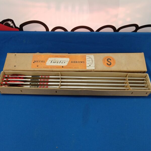 Vintage Firefly metal arrows, a collectible archery set.
