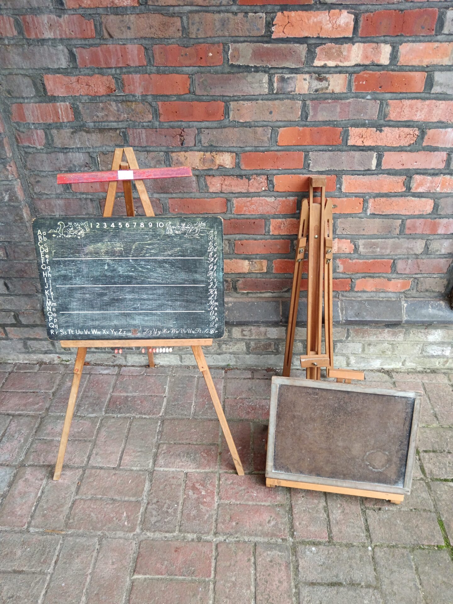 859 Three artists easels & two chalk boards