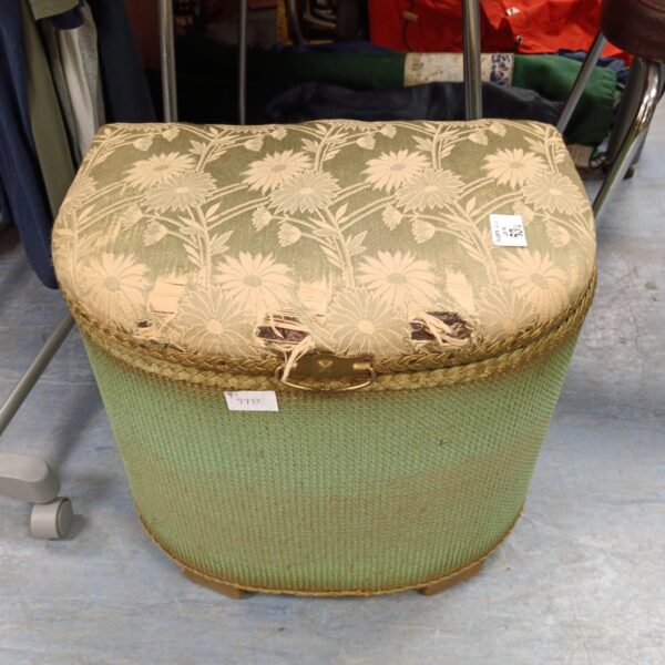 Vintage Lloyd Loom ottoman with patterned upholstery, a charming retro hall seat.