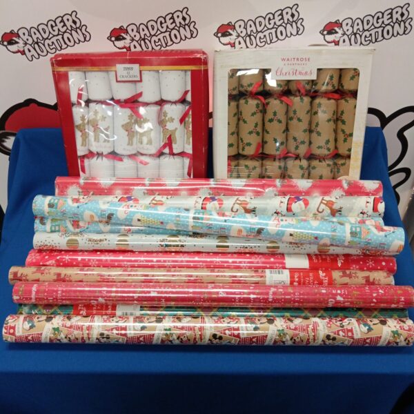 Colourful Christmas crackers and wrapping paper lot for festive celebrations.