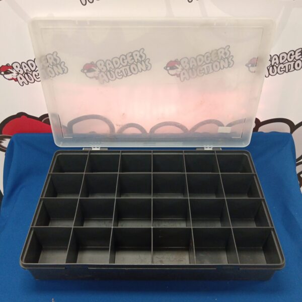 Large plastic compartmented storage box for parts and tools.