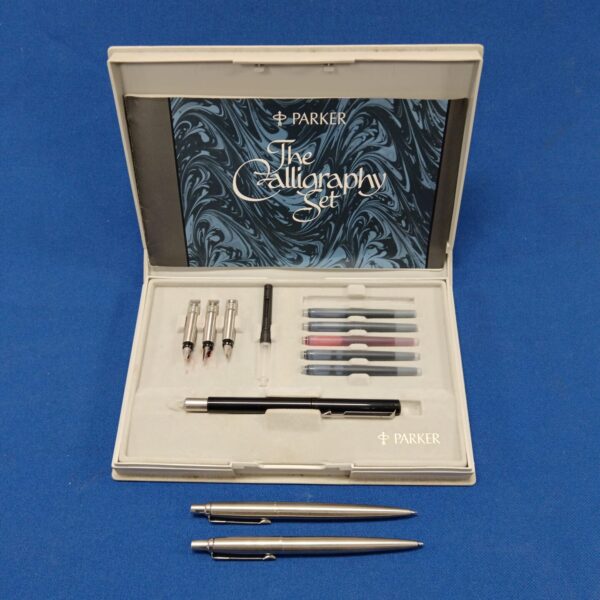 Vintage Parker calligraphy set with pens and nibs in case.