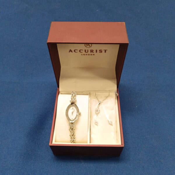 Accurist ladies watch and necklace set in presentation box.