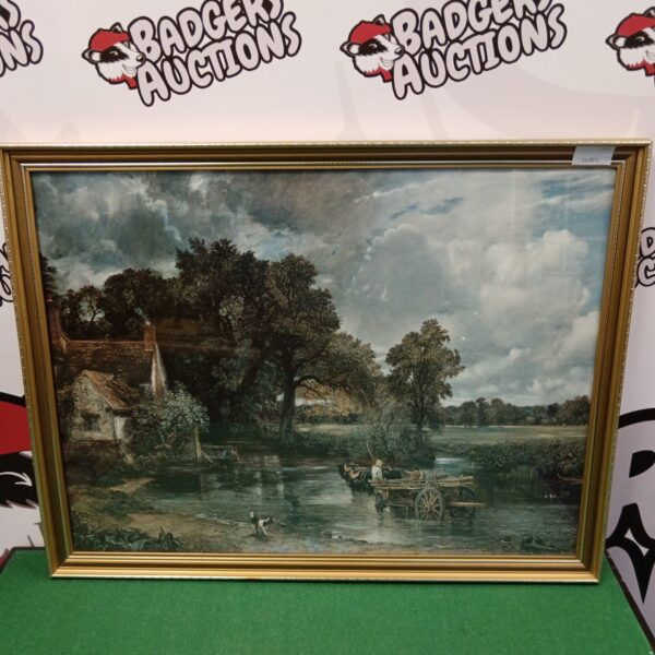 Vintage John Constable Hay Wain print in a gold frame.