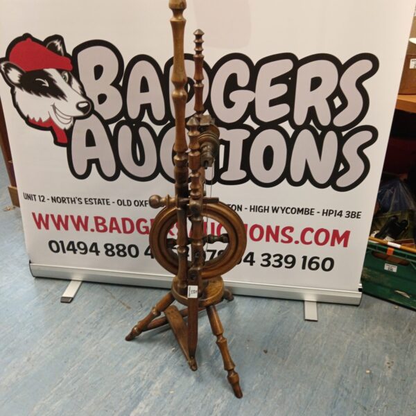 Vintage wooden spinning wheel for wool and flax.