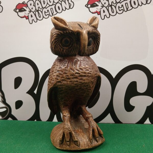 Detailed vintage hand-carved wooden owl sculpture for collectors.