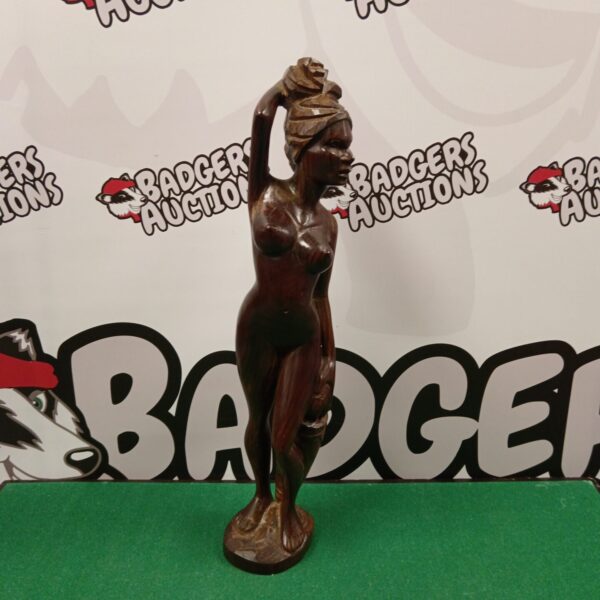 Hand-carved wooden African lady sculpture, a beautiful tribal art piece.