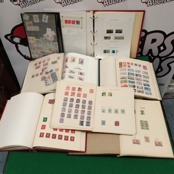 Vintage stamp album filled with colourful antique stamps.