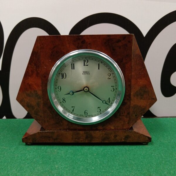 Vintage Art Deco Essell mantle clock with octagonal wooden case.