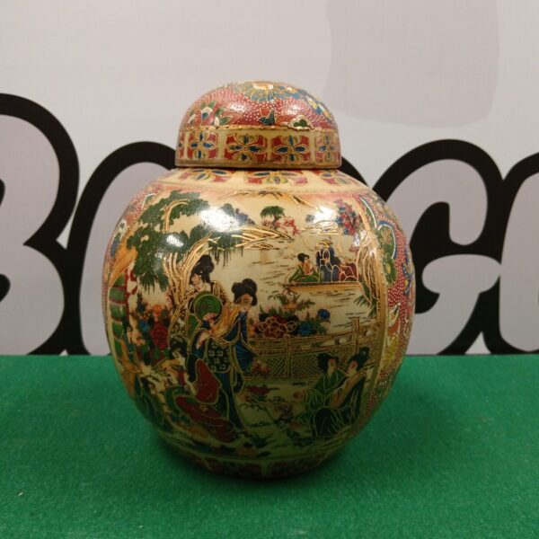 Hand-painted Chinese ginger jar with vibrant garden scenes.