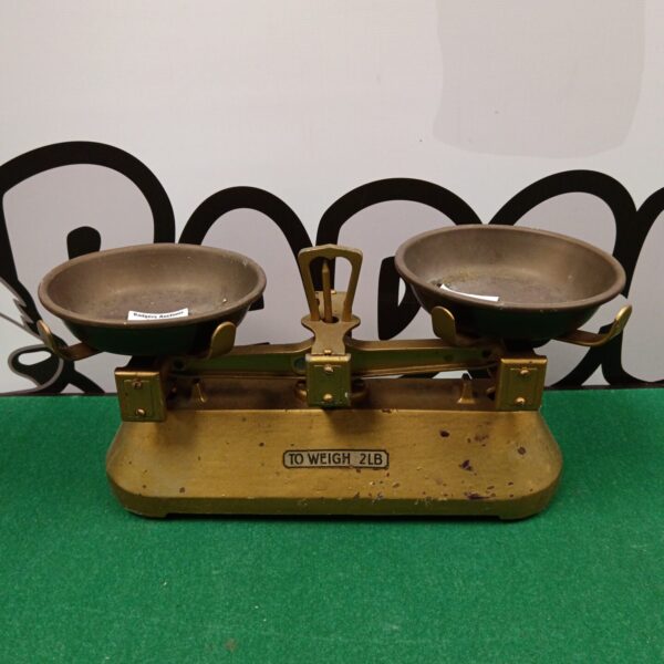 Vintage cast iron balance scales for accurate weighing.