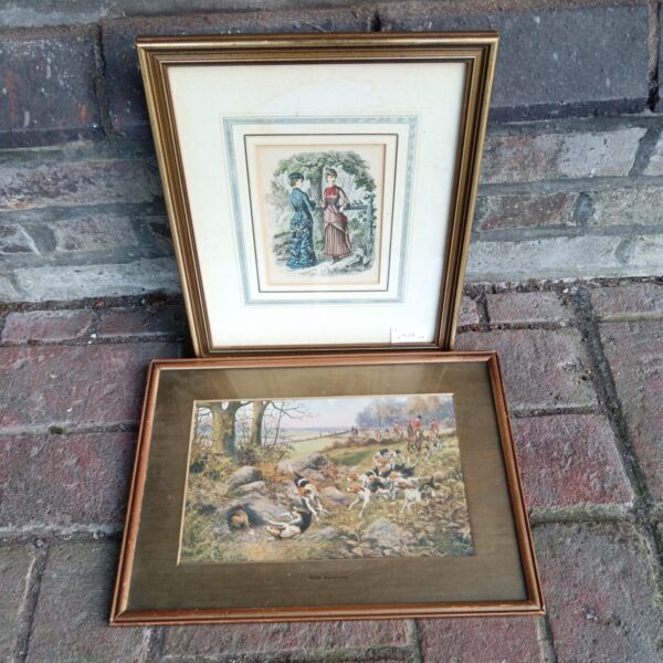 Antique Victorian engraving of elegantly dressed ladies in a garden.