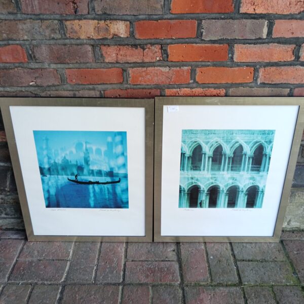 Framed artist signed prints of Venice canal scenes.