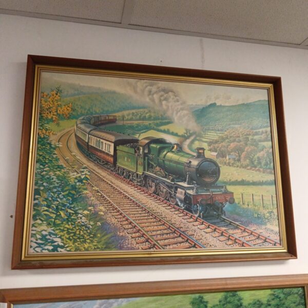 Framed Brian Tay steam train print in a rural landscape.