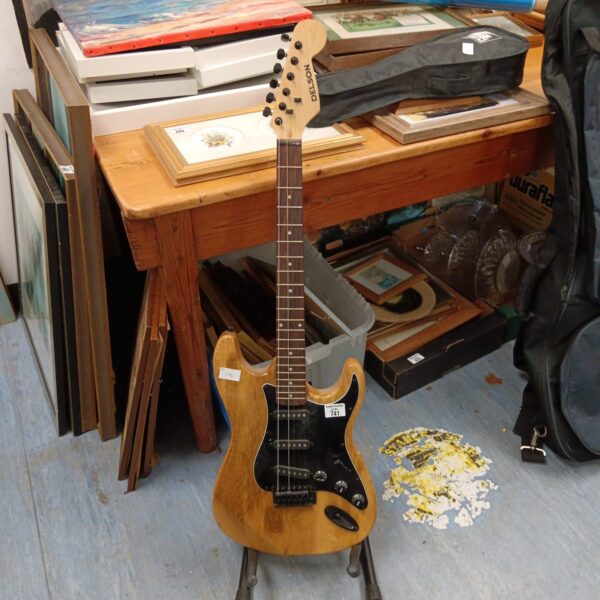 Vintage Delson electric guitar with a light finish.