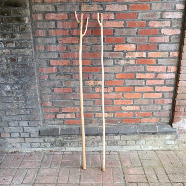 Pair of vintage shepherd's crooks for rural decor.