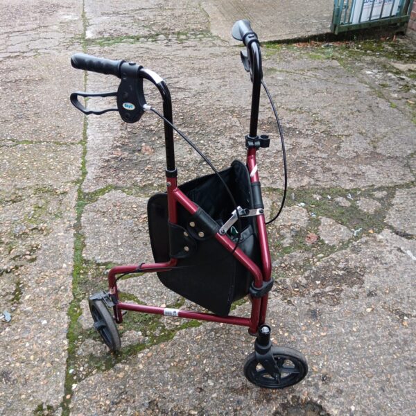 Red Days folding mobility trolley with shopping basket.
