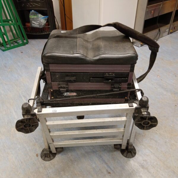 Portable match fishing tackle box with wheels and seat.