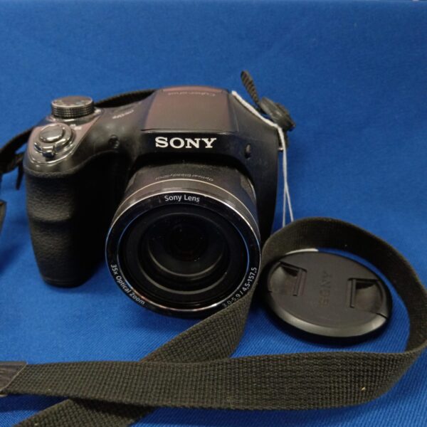 Sony Cyber-shot DSC-H300 digital camera with lens and strap.
