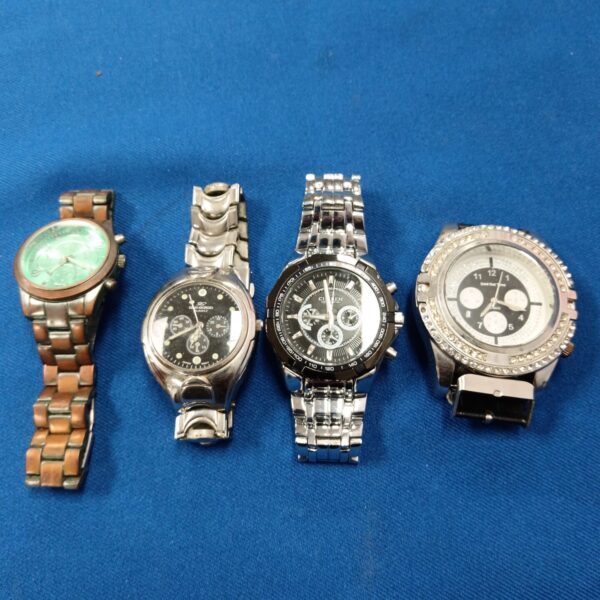 Lot of four gents fashion watches with stainless steel bracelets.