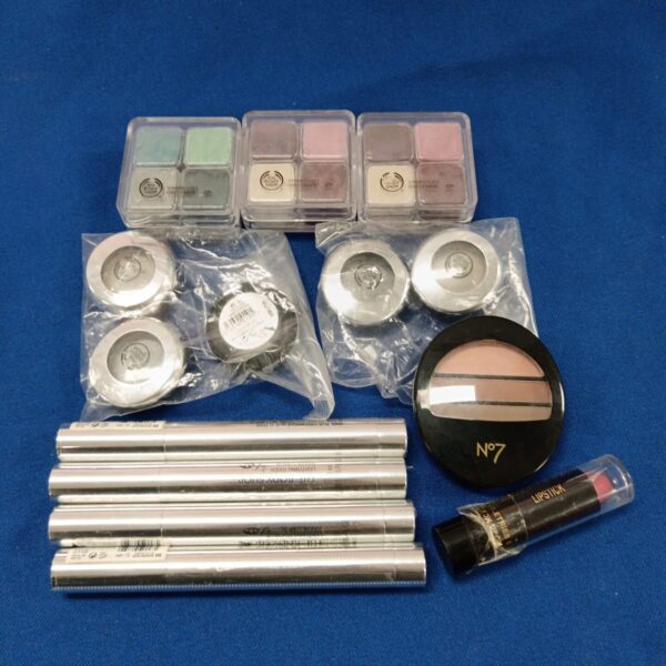 Assorted makeup tray from The Body Shop with various colours.