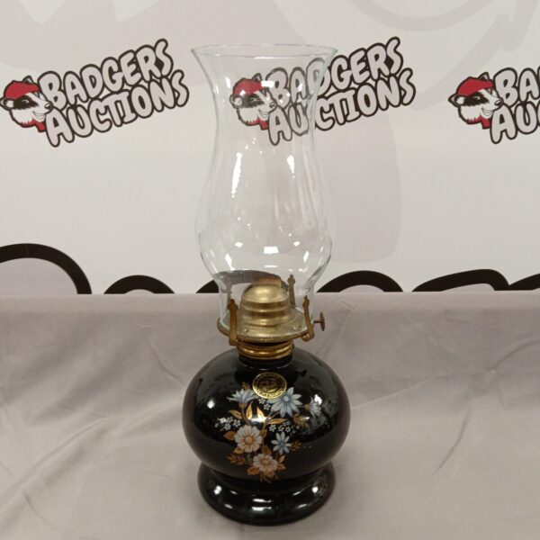 Vintage Lamplight Farms oil lamp with floral details.