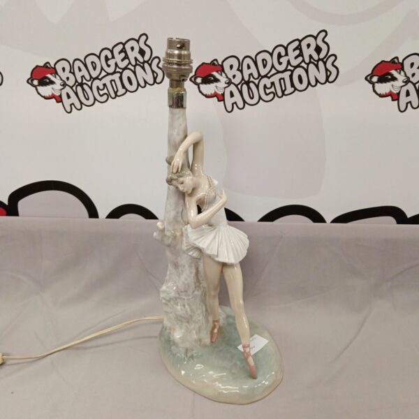 Elegant Lladro ballerina table lamp with porcelain figurine.