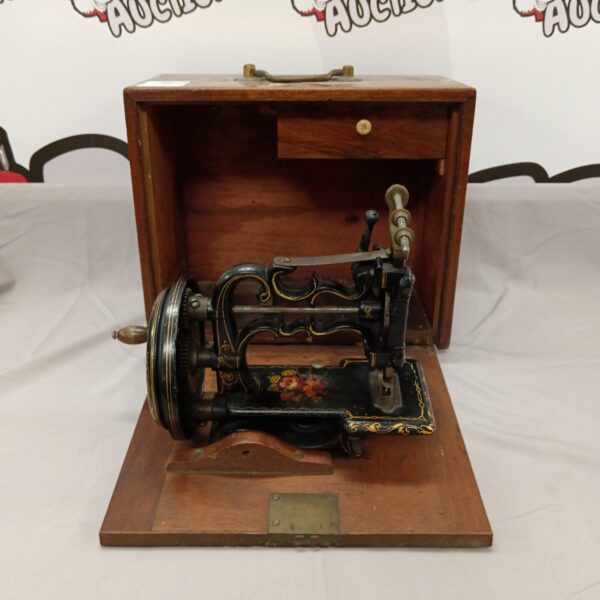 Antique Victorian miniature sewing machine by J & G Weir.