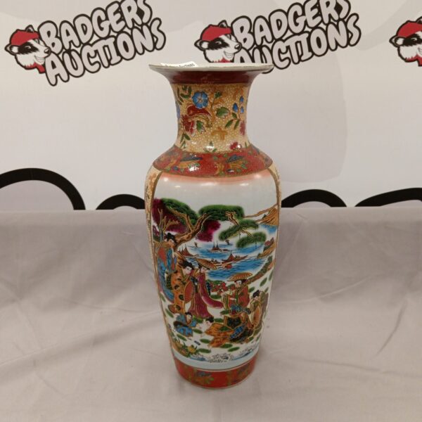 Intricate hand-painted Chinese porcelain vase with detailed scenes.
