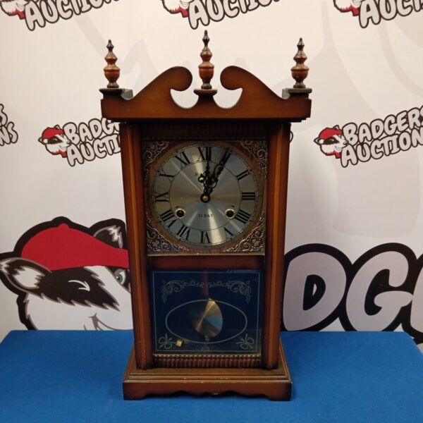 Vintage Highland 31 day chiming wall clock in good condition.