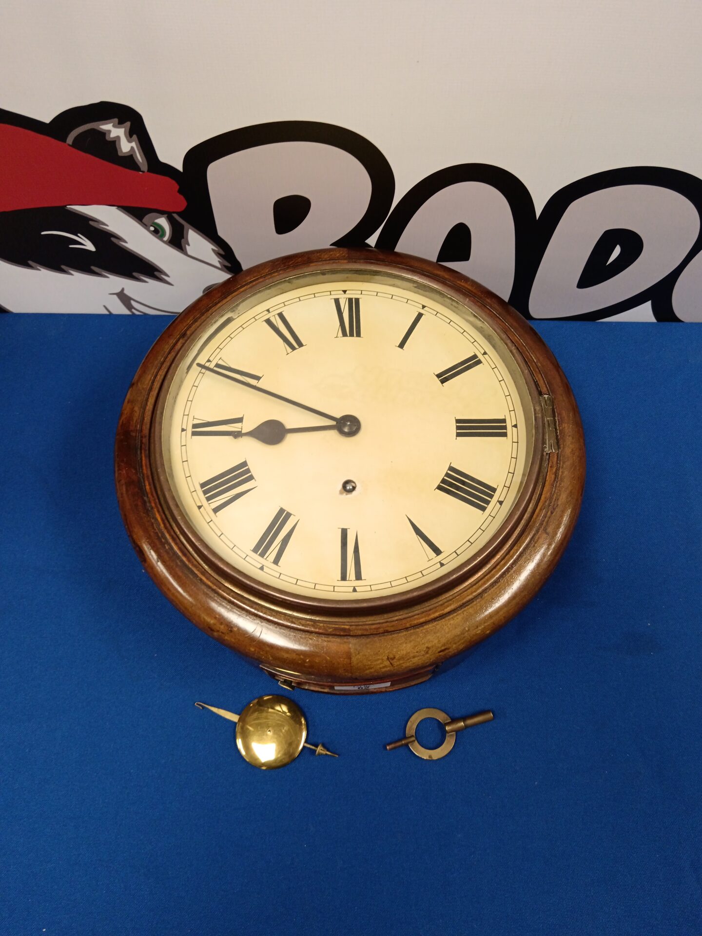 062 Antique w & h oak cased wall clock with pendulum & key