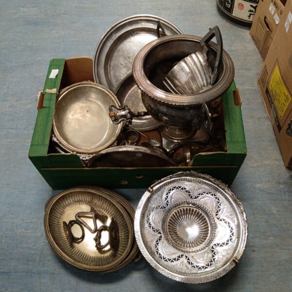Antique silver plate lot featuring a water urn and serving trays.