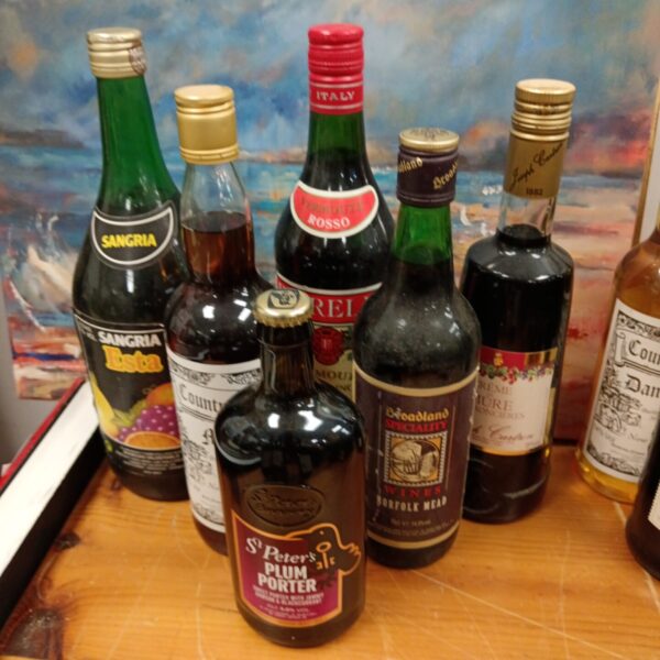 Vintage alcohol bottles lot including mead and Italian liqueurs.