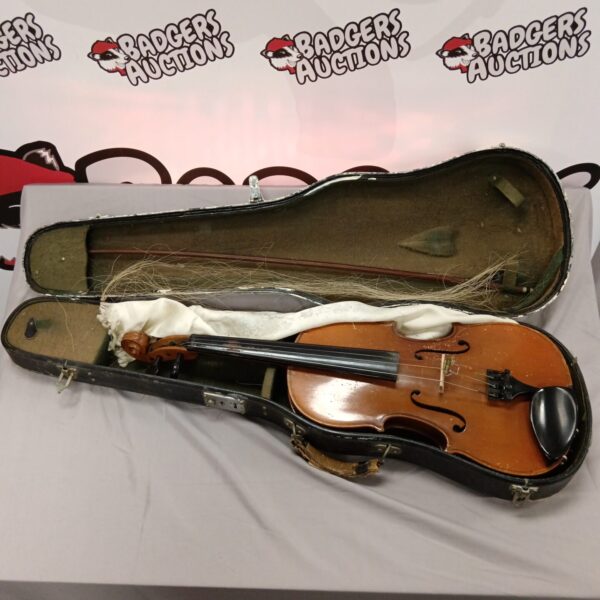Vintage Skylark violin inside its original case.