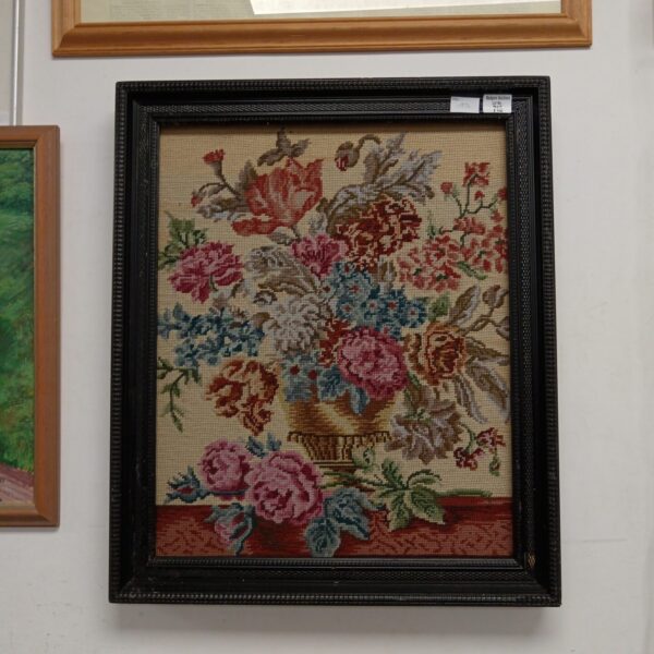 Large vintage floral embroidery picture of flowers in a vase.