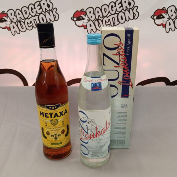 Vintage Metaxa and Loukatos Ouzo bottles, classic Greek spirits.