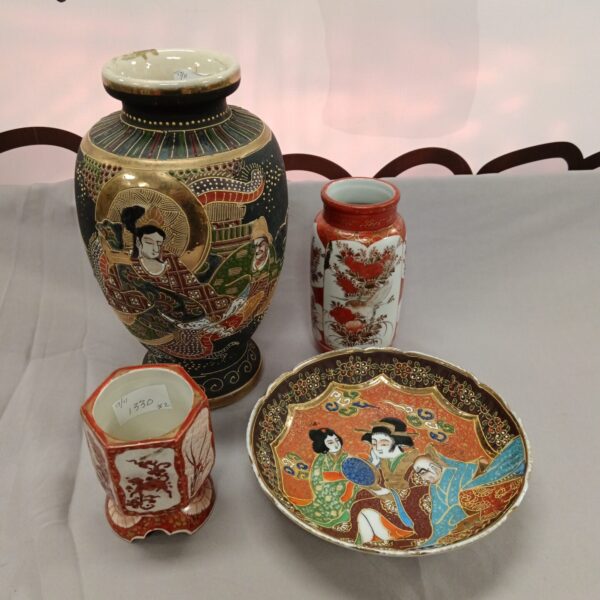Antique Japanese Satsuma vase with detailed figure painting.