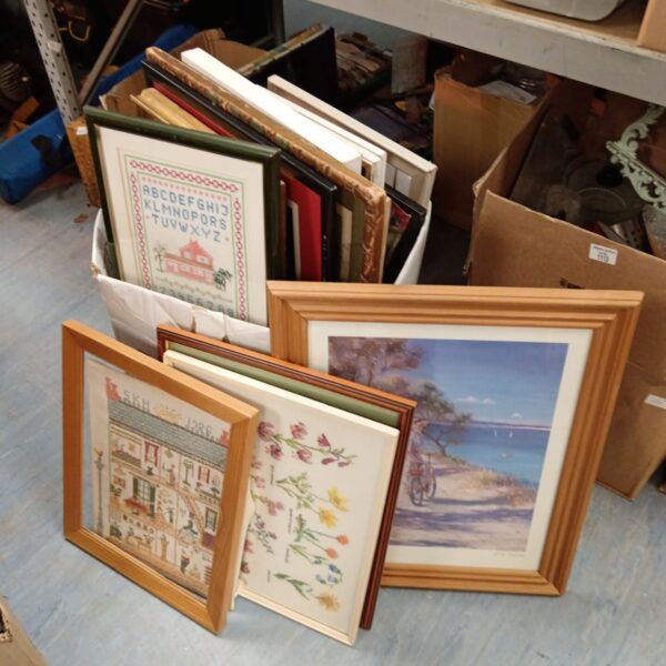 Large lot of assorted framed prints and artwork for home decor.