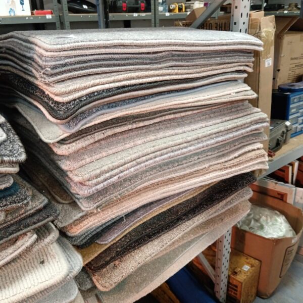 Diverse lot of carpet right samples for flooring projects.