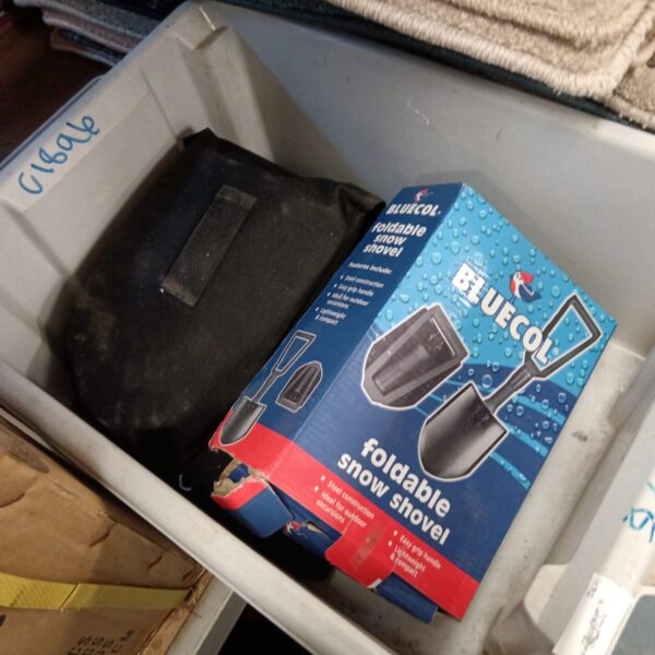 New lot of four folding shovels in original packaging.