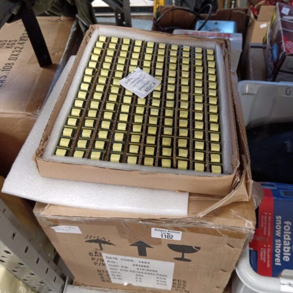 Lot of 900 new lamp transformers in original packaging.