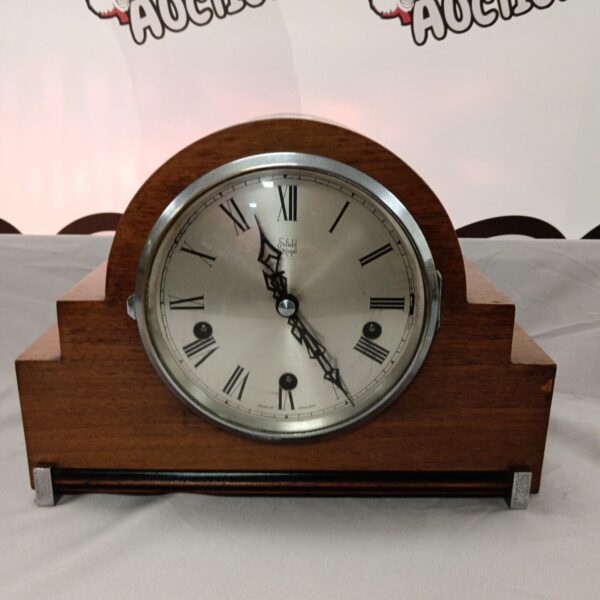 Vintage Enfield Royal Westminster chime clock on a surface.
