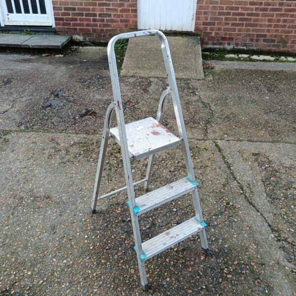 Vintage aluminium folding step ladder for household use.