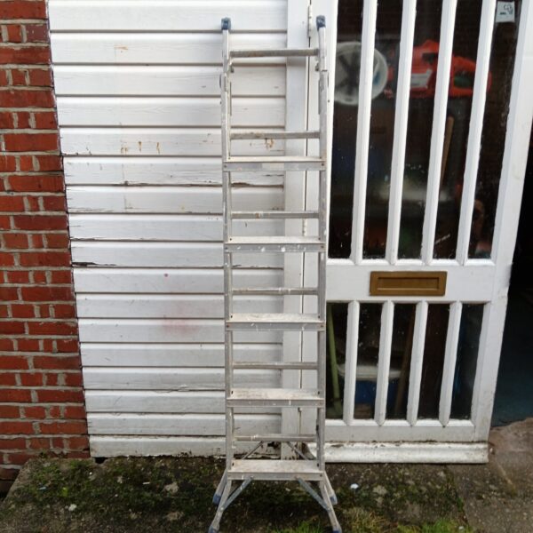 Vintage British aluminium extending ladder for DIY projects.