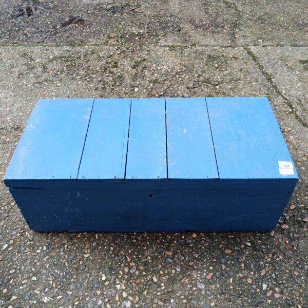 Blue painted wooden chest for storage and rustic home decor.