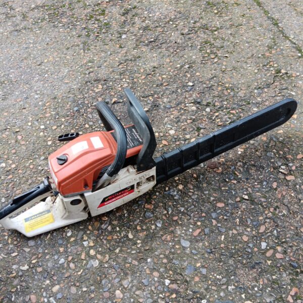 Vintage Neilsen petrol chainsaw for garden and DIY tasks.