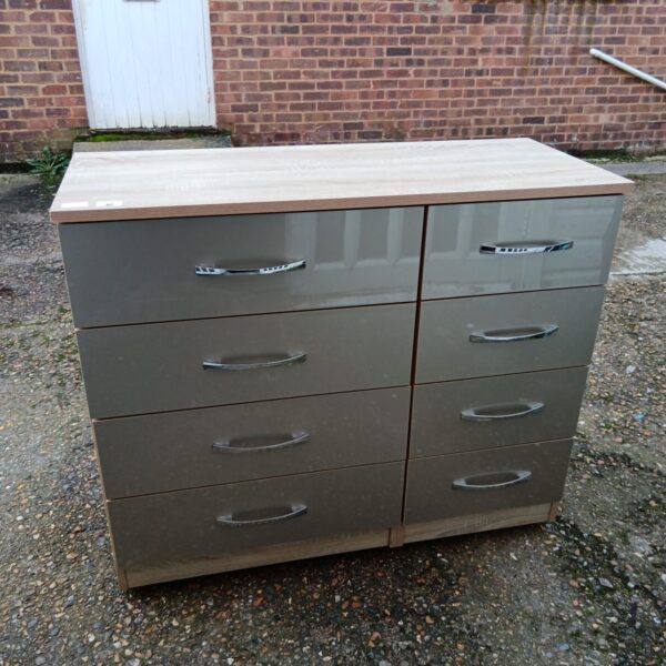 Grey 8-drawer cabinet with lacquered finish for bedroom or office storage.