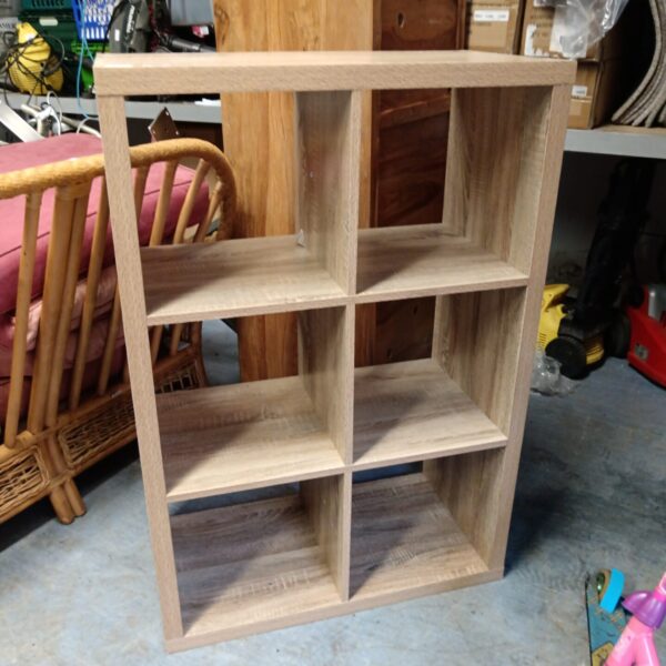 Six-cube storage unit in a room setting.