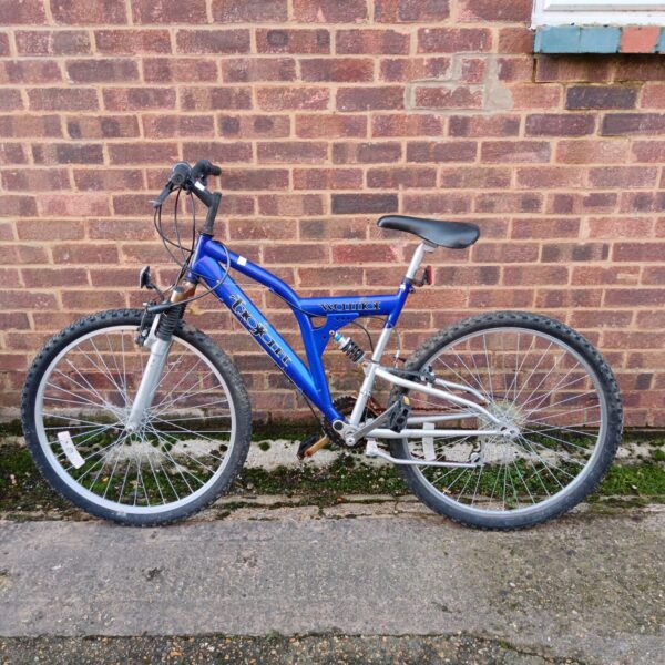 Blue Trojan Warrior mountain bike, vintage 1990s bicycle.