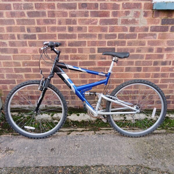 Side view of a vintage Raleigh Dorado mountain bike.